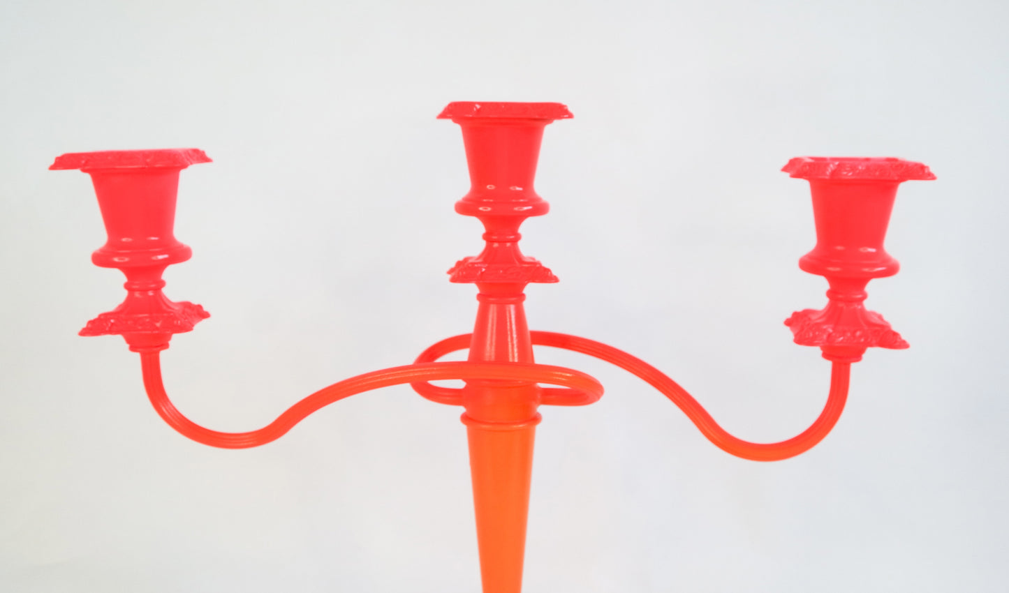Neon candle stick holder